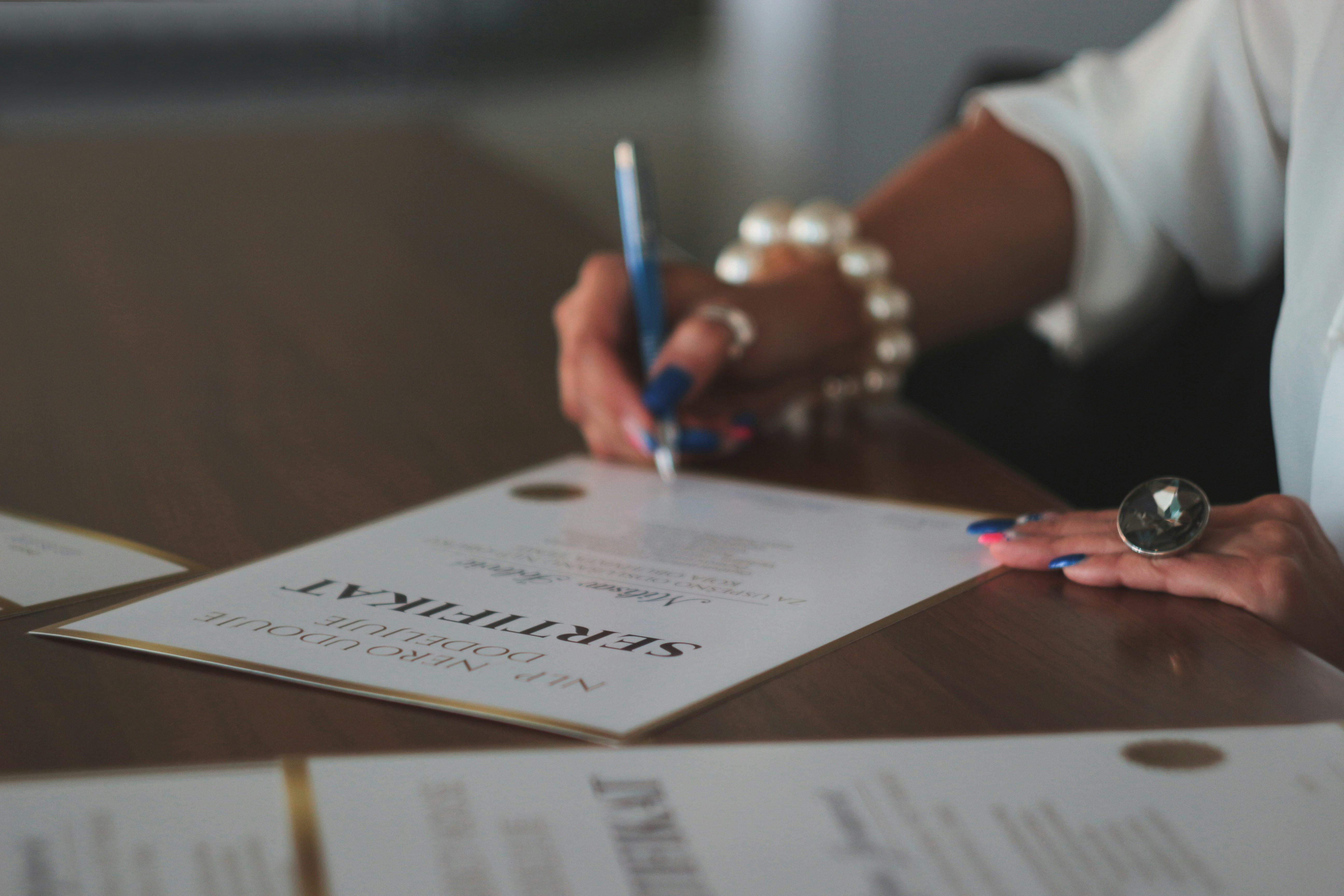 Investor completing sign-up documentation